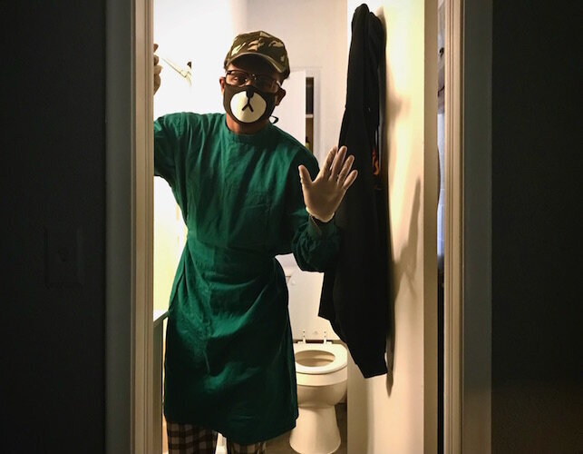 Quarantining at home means your family somehow has to avoid you. A wave from the bedroom doorway, garbed in a PPE gown, mask and goggles, was the closest one of my sons would come.