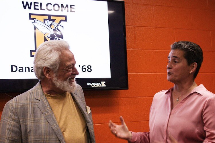 Kalamazoo College Director of Athletics Becky Hall thanks Dana Getman ’68 for his $500,000 gift establishing the Getman Endowment for Equity in Women’s Athletics during a fund announcement event with Kalamazoo College women’s coaches.