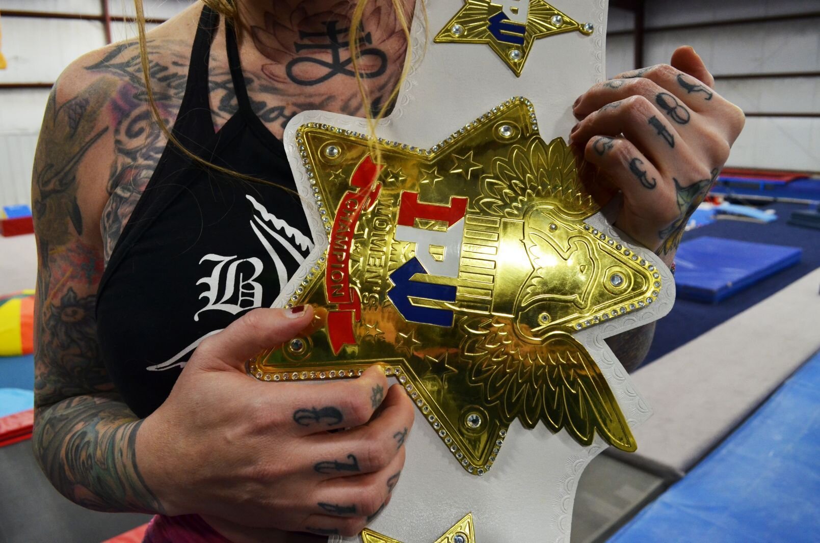 Davison Sarai with her championship belt.