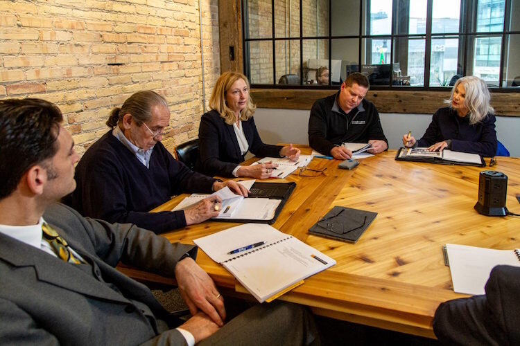 Board members of the Waséyabek Development Company during  a monthly meeting at their headquarters in downtown Grand Rapids.