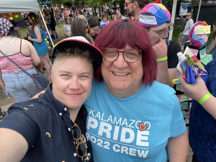 Dell Darnell, Program Manager of OutFront Kalamazoo, with Regan Hanley celebrating Pride.