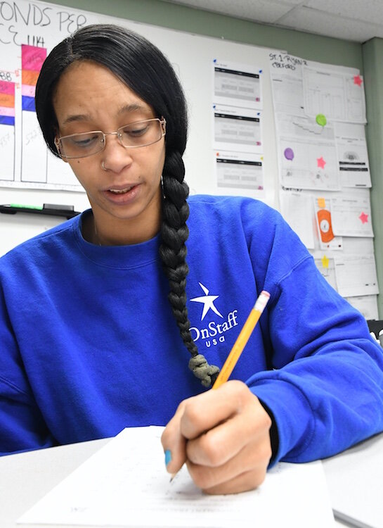Lilleana Bottom, DENSO employee, is working toward her GED diploma on site at the plant in Ft. Custer.