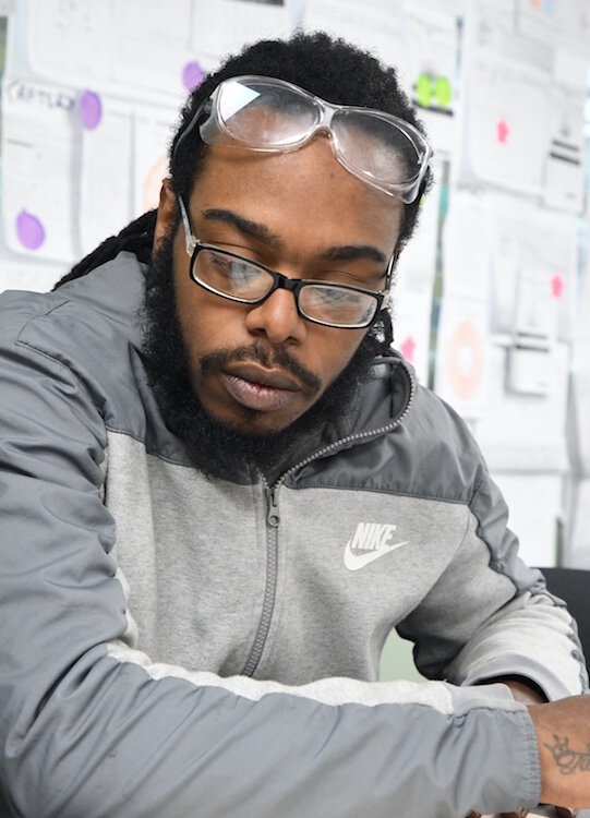 DENSO employee Deandre Muldrow enrolls in the GED program. 