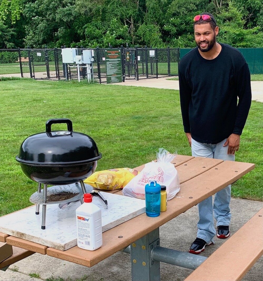 Charles Young and a friend said they missed the spirit of community so two years ago they started bringing a grill and food to share with other dog lovers at Fairmount Dog Park.