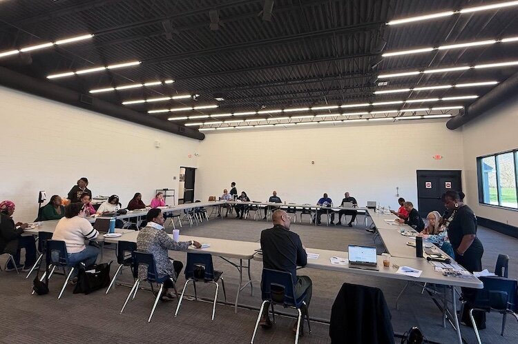 Participants at a recent meeting of Douglass Association Tenants and Partners discuss upcoming opportunities for the community. 