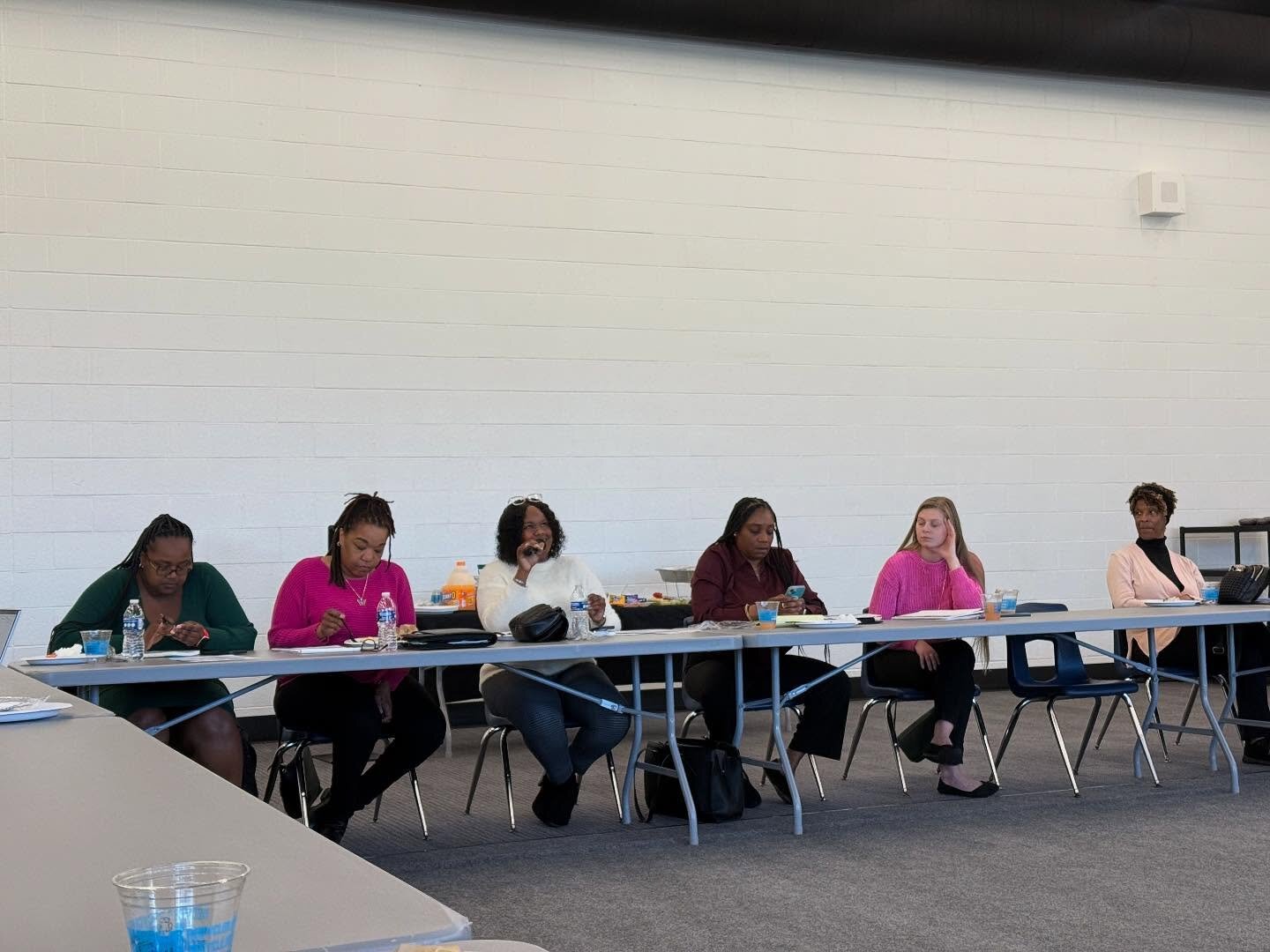 Participants at a recent meeting of Douglass Association Tenants and Partners discuss upcoming opportunities for the community. 