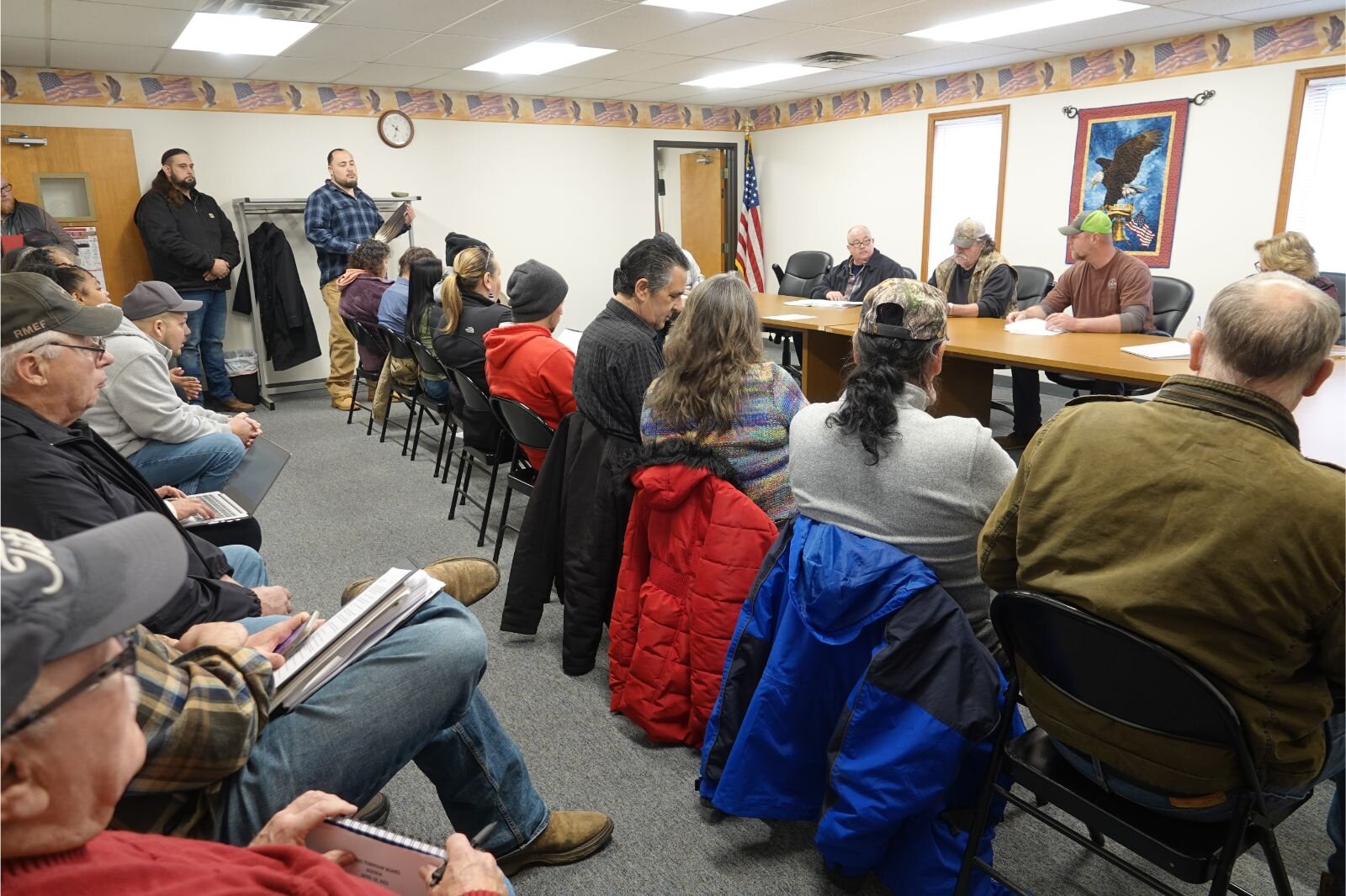 Tribal Members listen to Athens Township board comments.