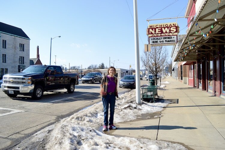 Dean Hauck, owner of Michigan News Agency, feels Michigan Ave. has hindered her business since 1965, when it was changed to a one-way street.