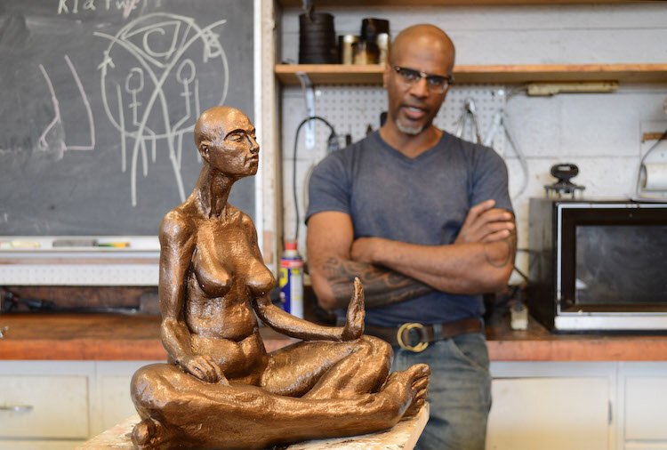 Media coverage for the local artists of "Where We Stand”, including sculptor Brent Harris was a proud moment for Belinda Tate, Executive Director of the Kalamazoo Institute of Arts.