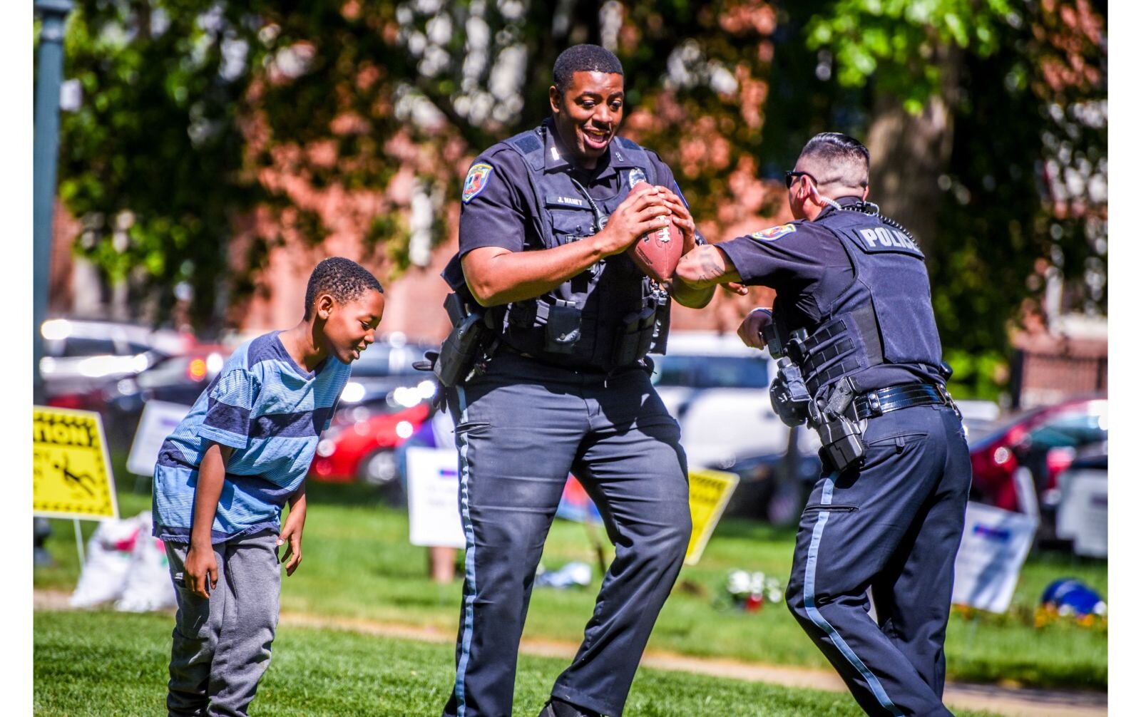 KPS joins Tamika Williams' children, Elijah and Olivia, for an impromptu game of ball. 