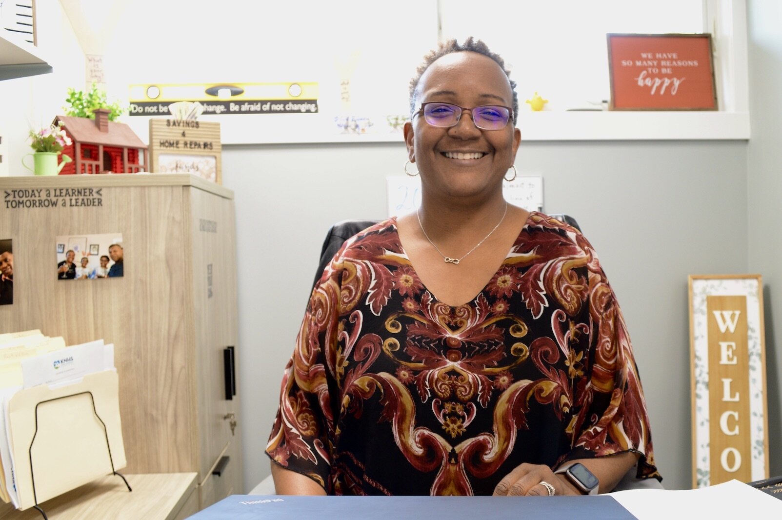 HUD Certified homeownership coach Apryl Munyanshongore in her KNHS office.