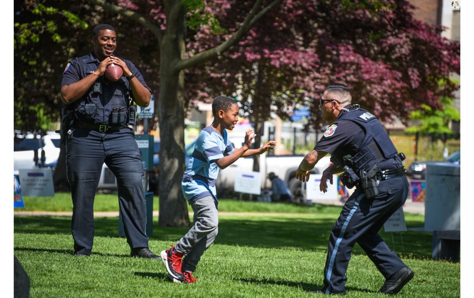 KPS joins Tamika Williams' children, Elijah and Olivia, for an impromptu game of ball. 