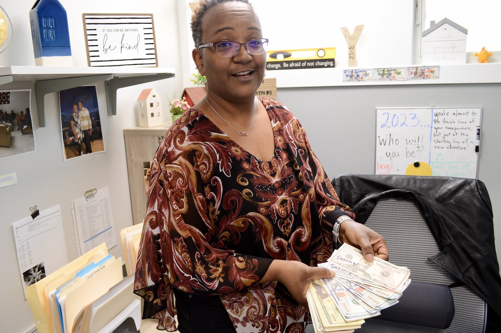 HUD Certified homeownership coach Apryl Munyanshongore in her KNHS office.