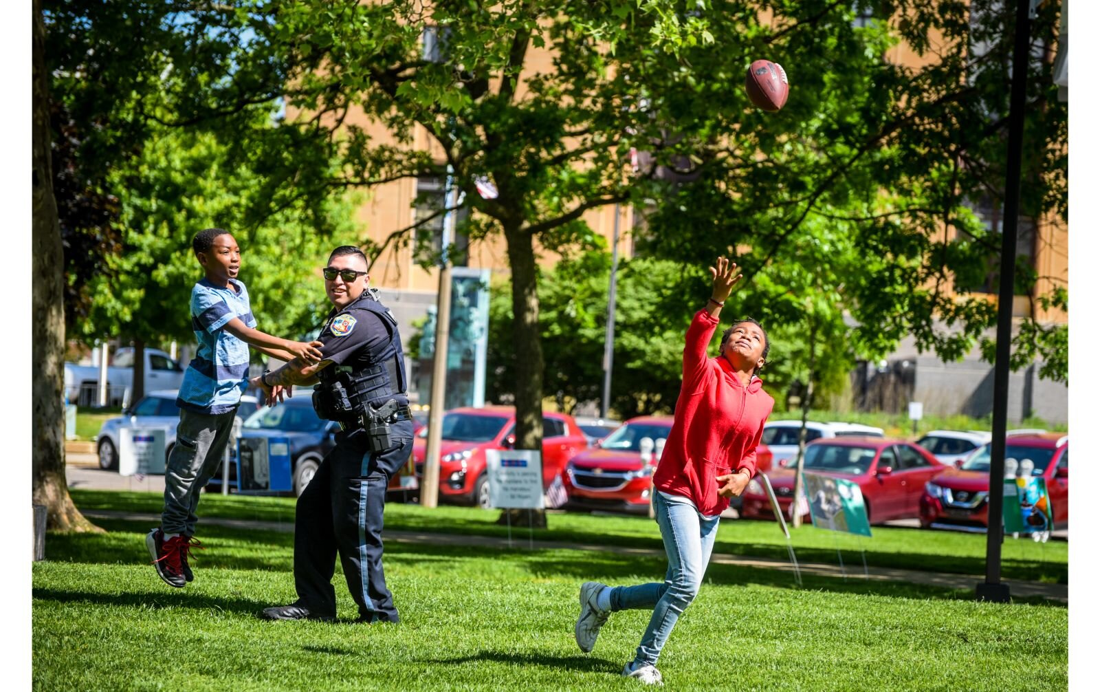 KPS joins Tamika Williams' children, Elijah and Olivia, for an impromptu game of ball. 