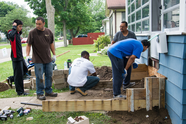 Residents work together on a recent Building Blocks project on Lane Boulevard.