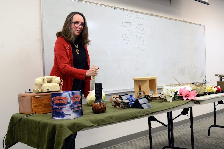 Sharon Mais, leading All Ears Theatre’s sound effects workshop demonstrates how stabbing cabbage can sound like a mortal-wounding by sword.