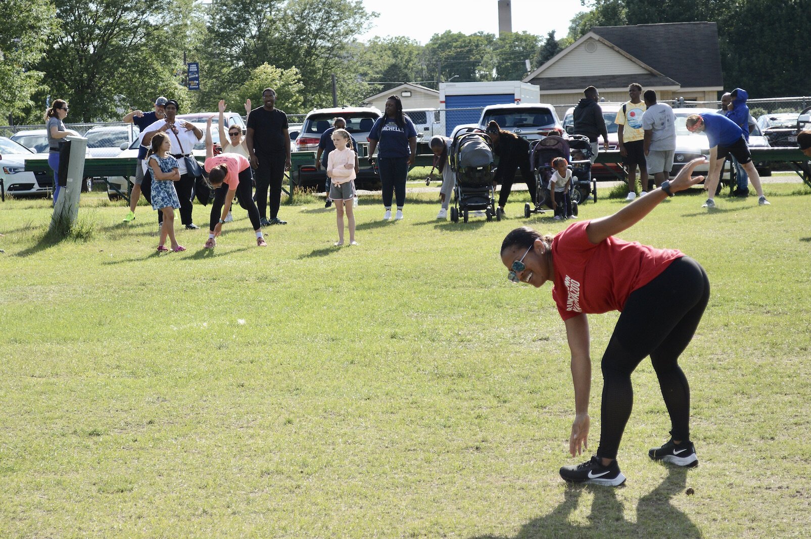 Carmen James (red shirt) warming-up the RTT group.