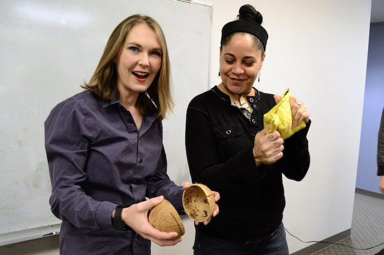 All Ears regulars Laura Henderson (with coconut shells) and Jen Hebben (with bag of corn starch) make the sounds of a horse trotting and footsteps in the snow.