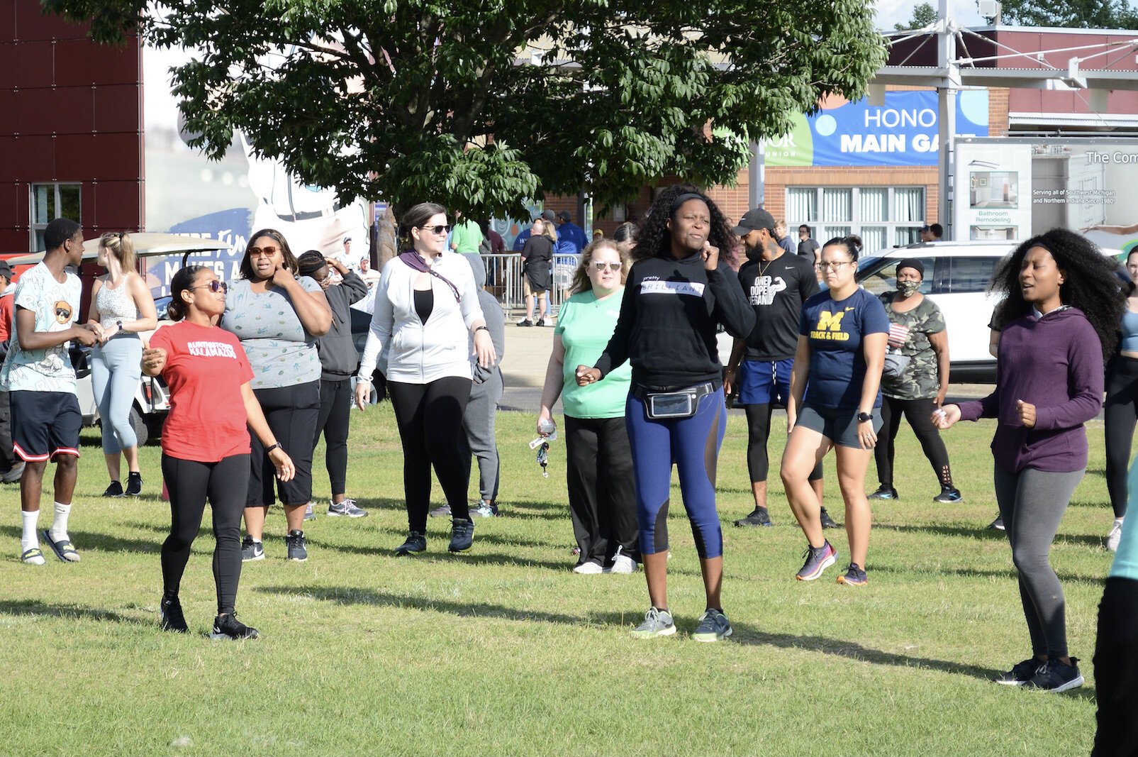 Carmen James (red shirt) warming-up the RTT group.