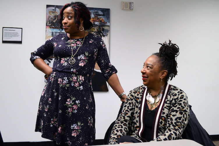 Marissa Harrington, Face Off Co-Founder and Artistic Director, and Betty Lenzy, Volunteer Coordinator, in the Black Arts and Cultural Center conference room.