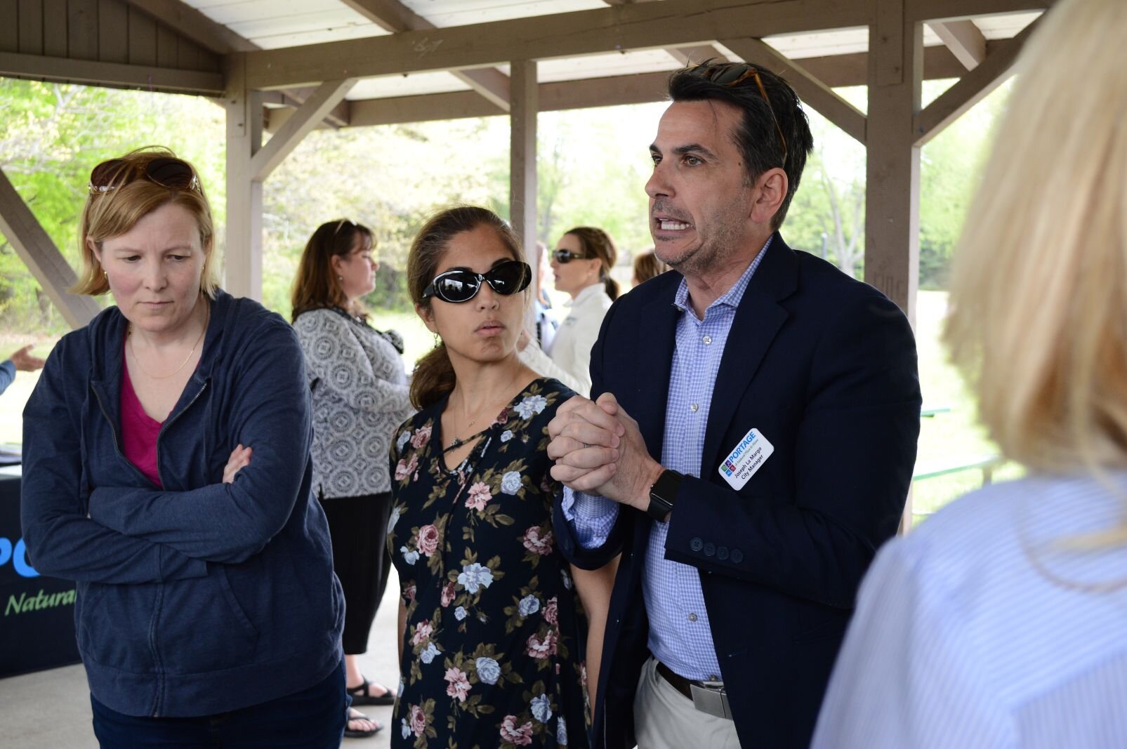 Portage Mayor Patricia Randall and Mayor Pro Tem Jim Pearson meet with residents at the open air open-house for the Lake Center District Corridor Placemaking study May 15.