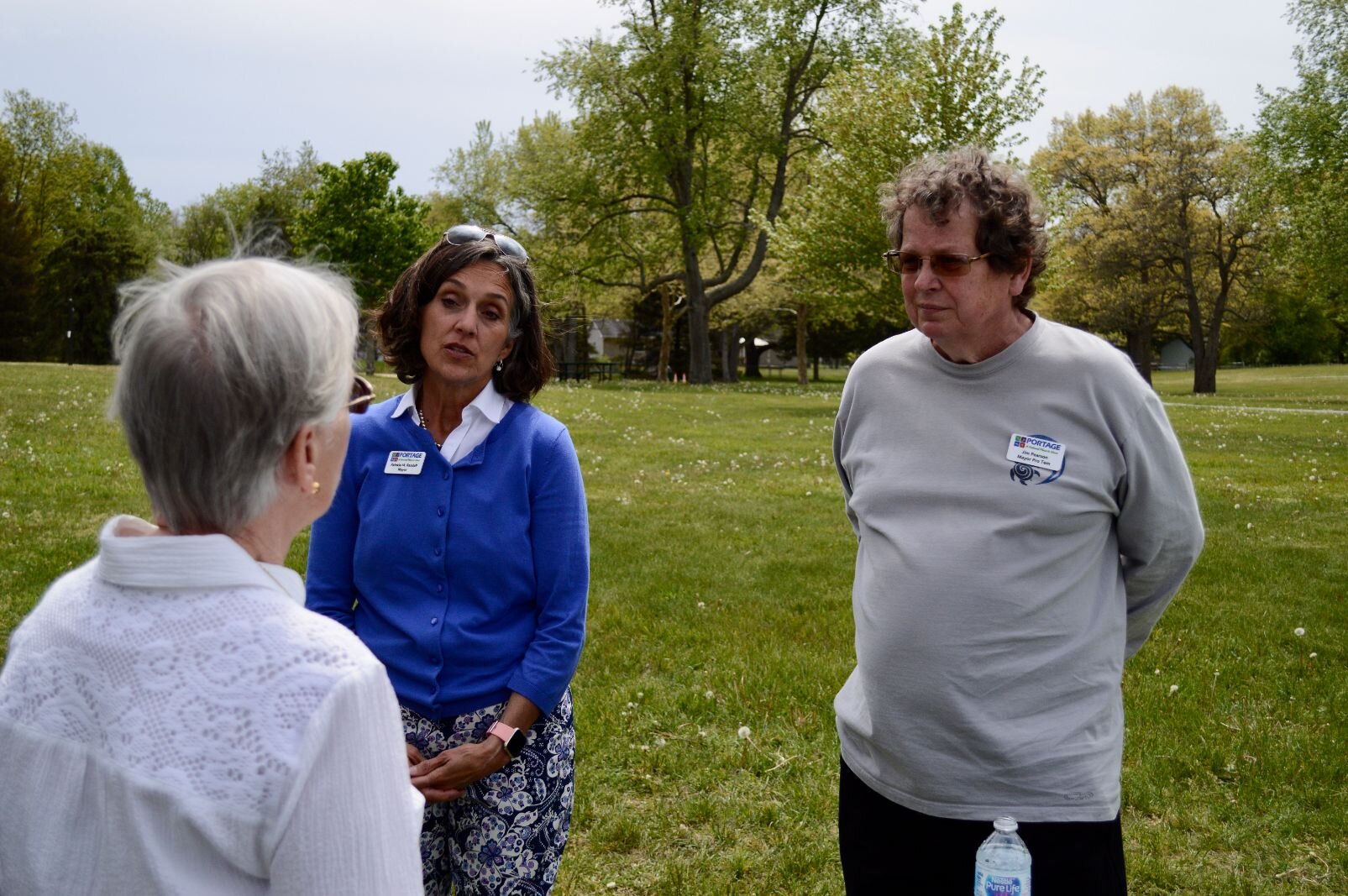 Portage Mayor Patricia Randall and Mayor Pro Tem Jim Pearson meet with residents at the open air open-house for the Lake Center District Corridor Placemaking study May 15.