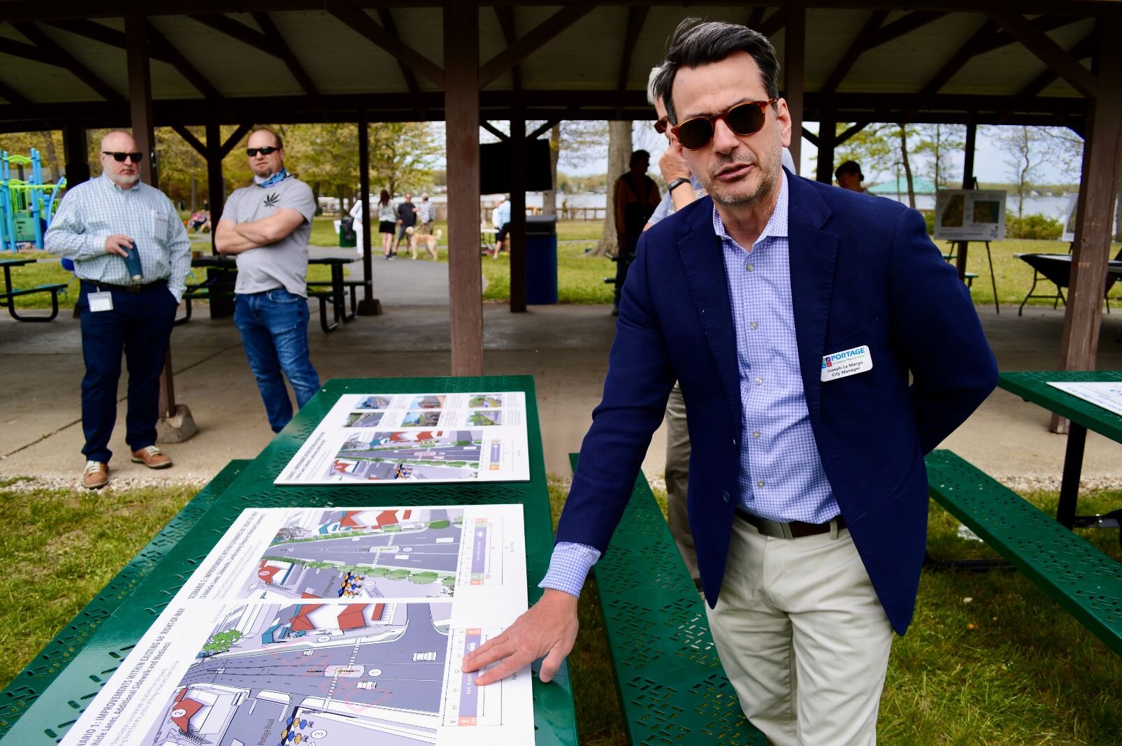 Portage City Manager Joseph La Margo points out the differences between the three scenarios for Portage Road outlined by the study.