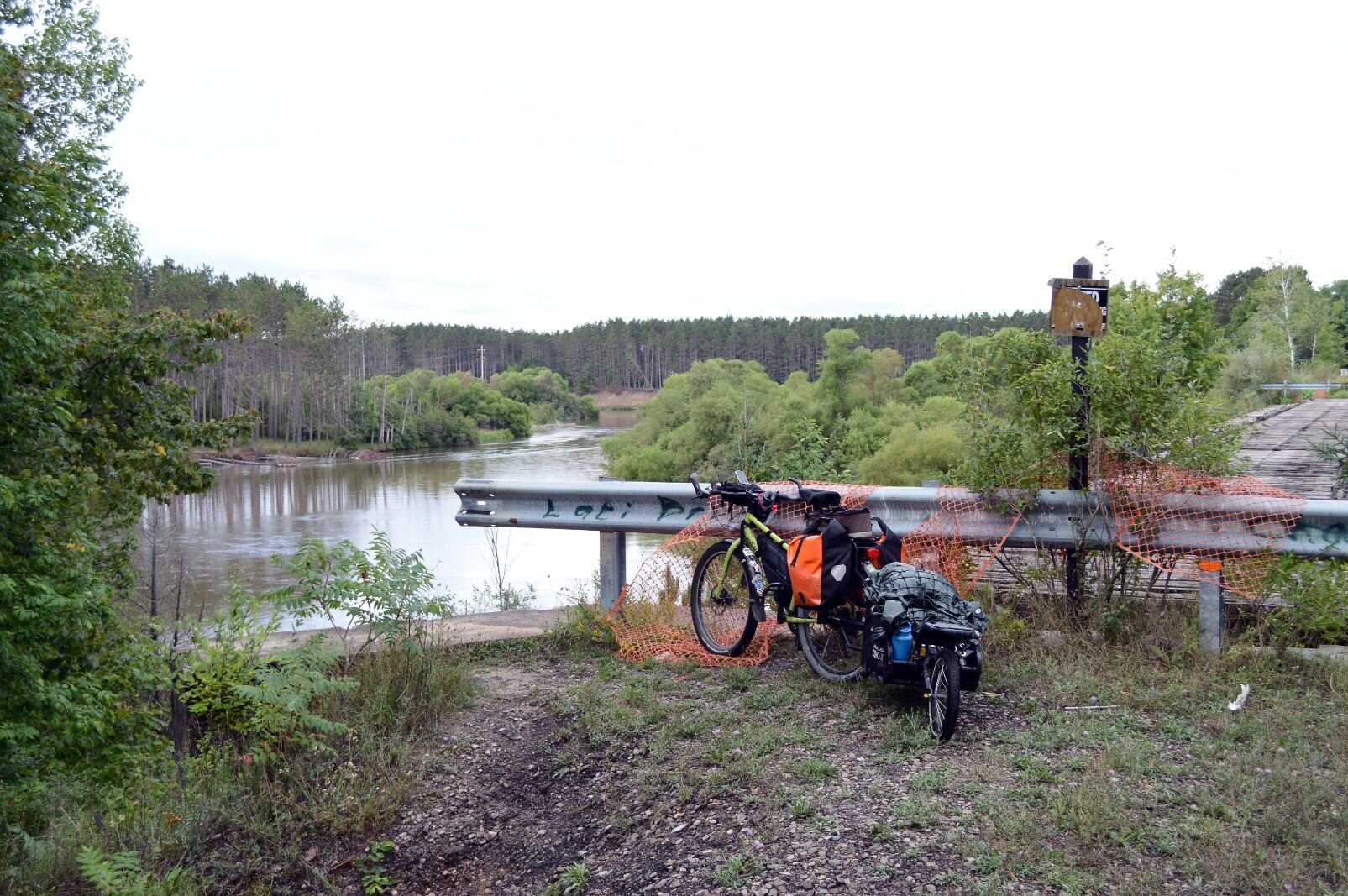  One has to be able to face roadblocks, turn around, find another way. Old unsafe railroad bridge leaving Mesick.