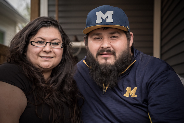 Ariel and Esteven "Esto" Juarez at home in the Edison neighborhood.