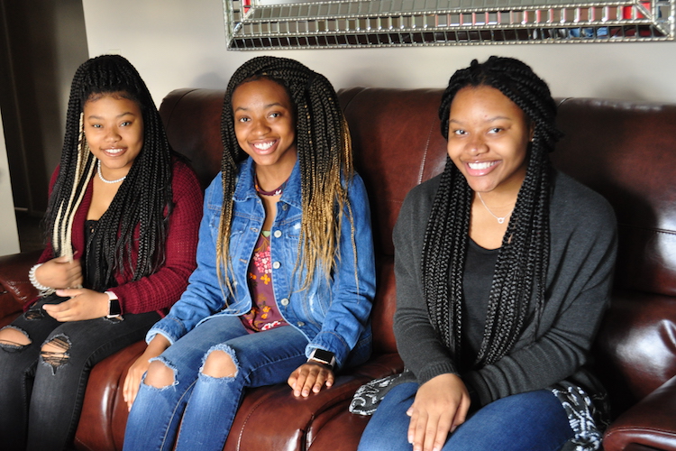 Ke’Aujanaa, Ke’Asia, and Ken’Aujune Shepherd-Friday together at home. Caring for Ke'Aujanaa, 16, who has sickle cell anemia, and illness that affects one out of every 365 African Americans