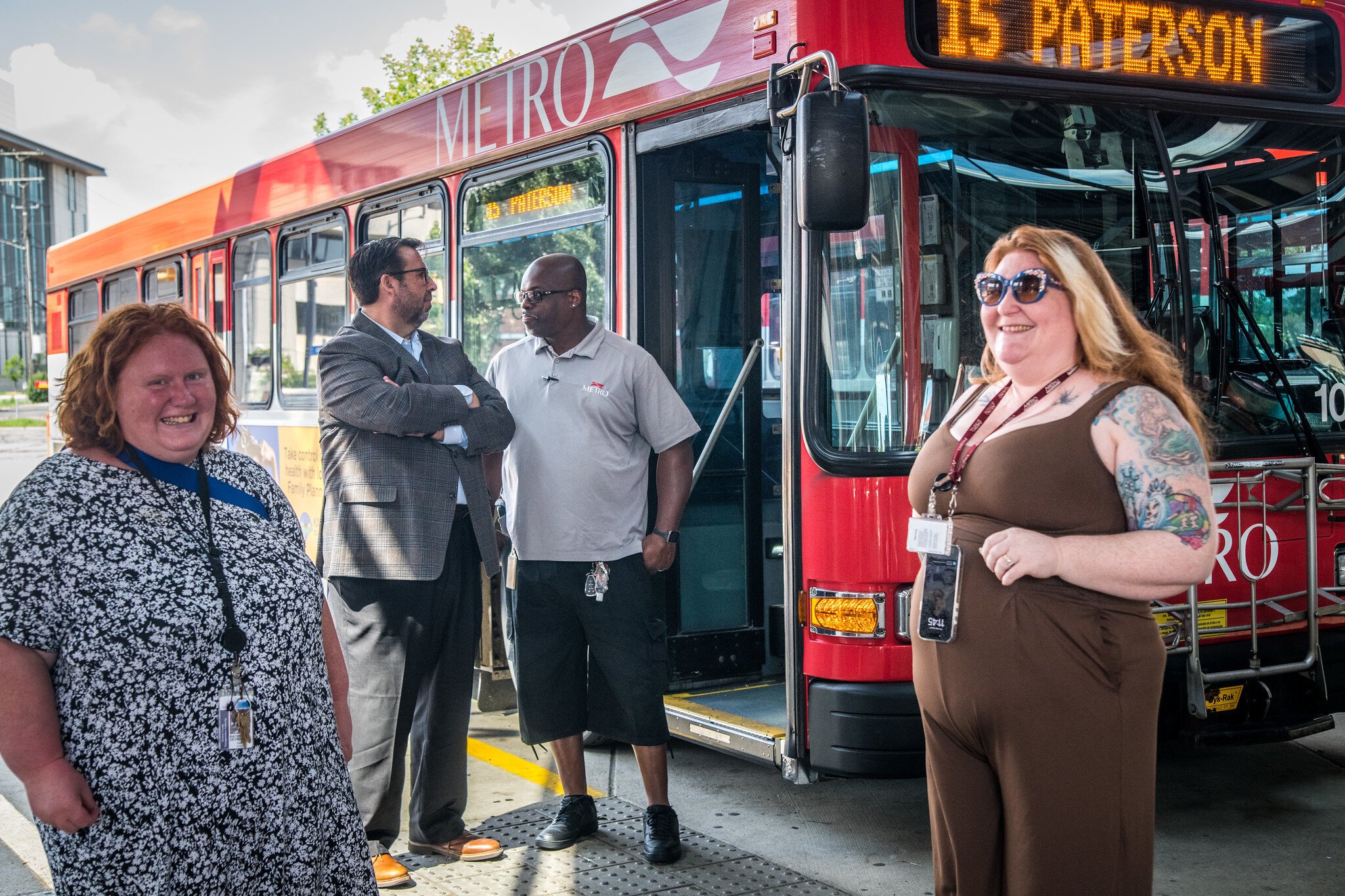 A few Kalamazoo Metro Transit employees gather at the Kalamazoo Transit Center (L-R): Rachel DeVries, Sean McBride, Michael Jackson, and Emily Lower Urban.