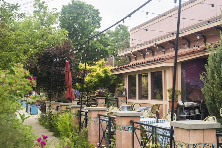 Outdoor seating at Martini’s, the only restaurant who draws a crowd “without a sign out front,” according to Vine resident Sharon Ferraro.