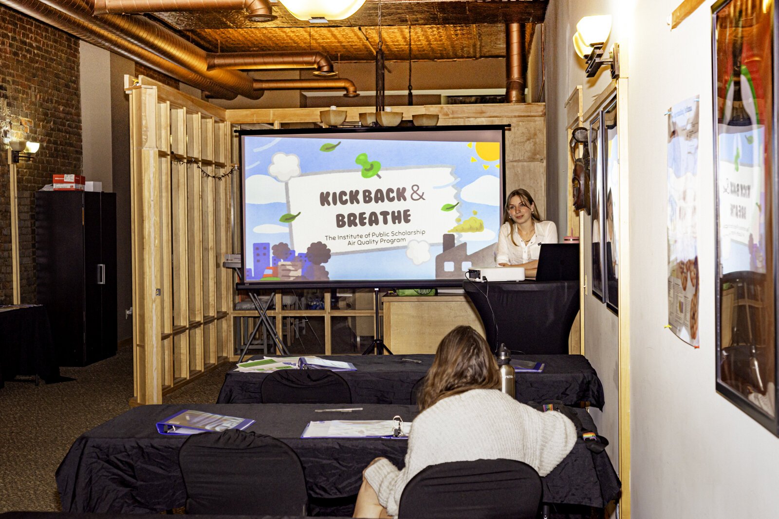 Kennedy Williams presenting at a Kick Back & Breathe event.