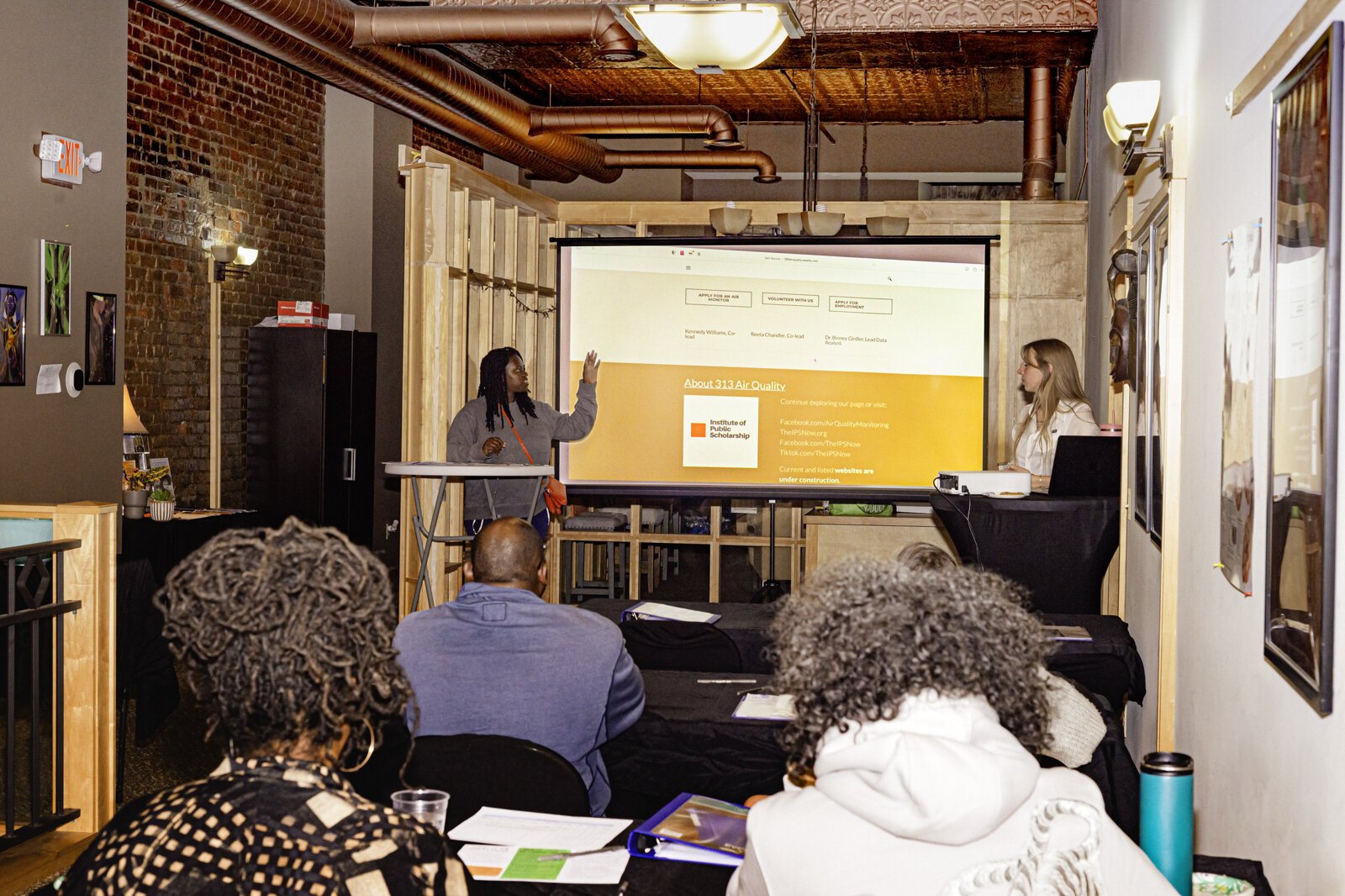 Institute Team members Reeta Chandler and Kennedy Williams presenting