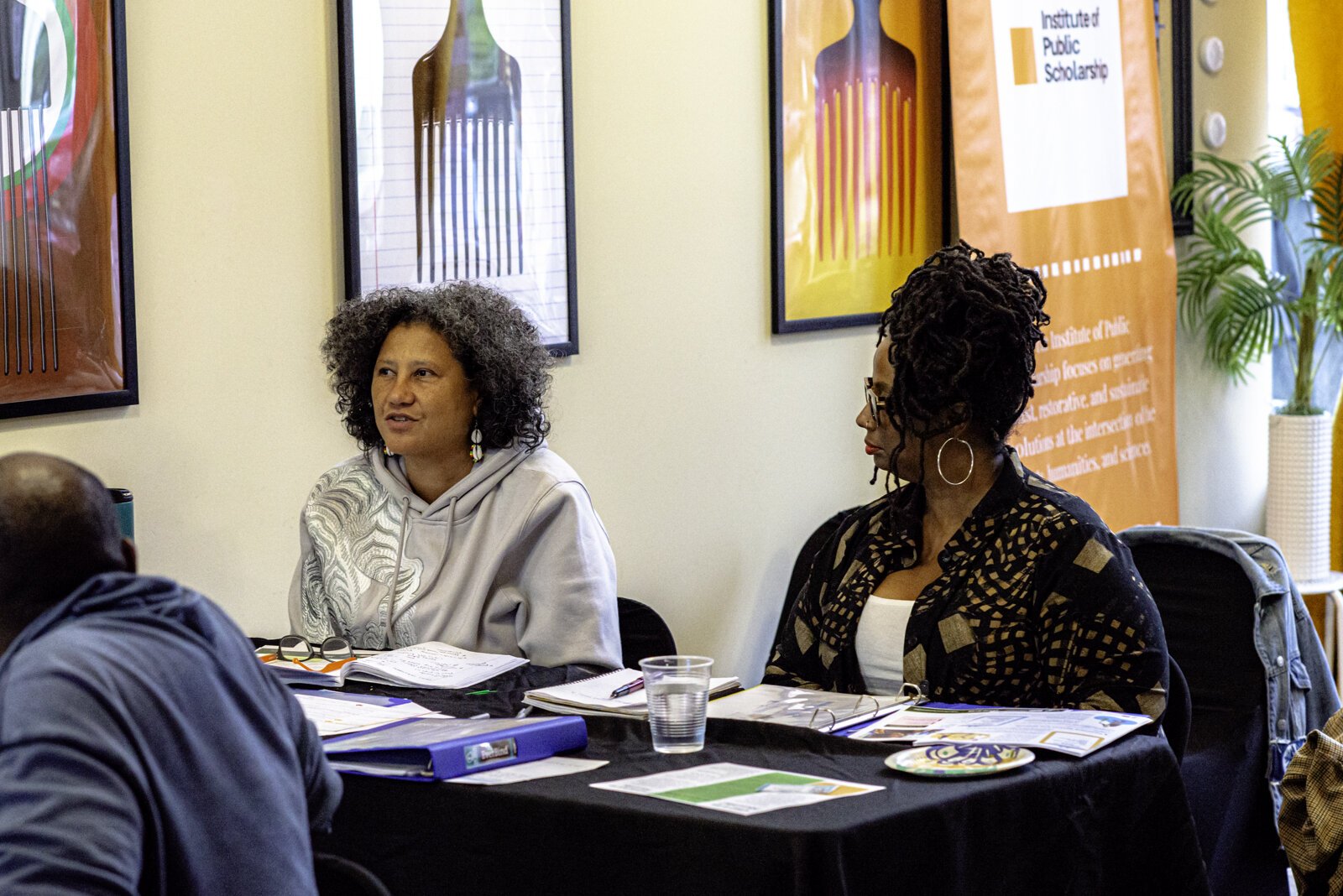 Institute team leaders Dr. Michelle S. Johnson and Denise Miller discussing air pollution in Kalamazoo