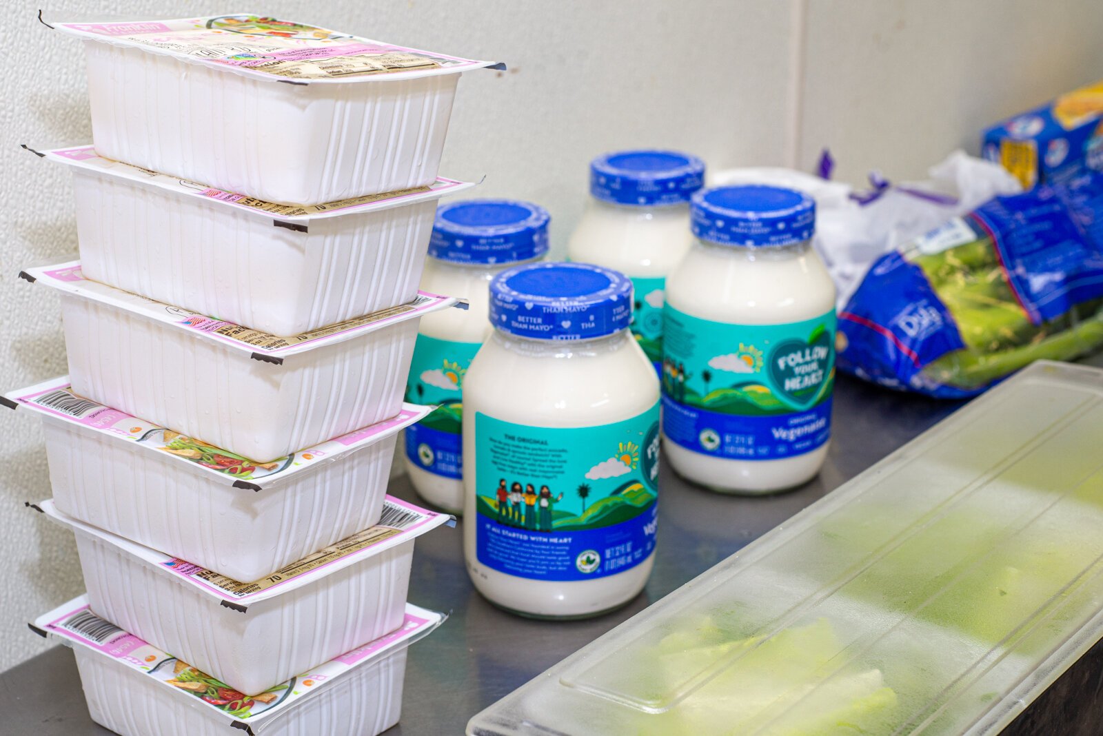 Celery and vegan mayonnaise are some of the fixings ready to go into potato salad for custormers of the Dirty Vegan. 