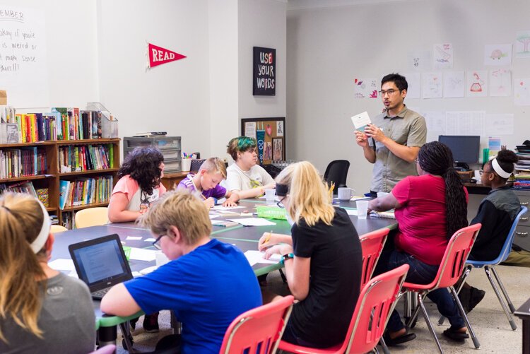 Jason Conde, RAWK Director of Education, explains a project to summer campers.