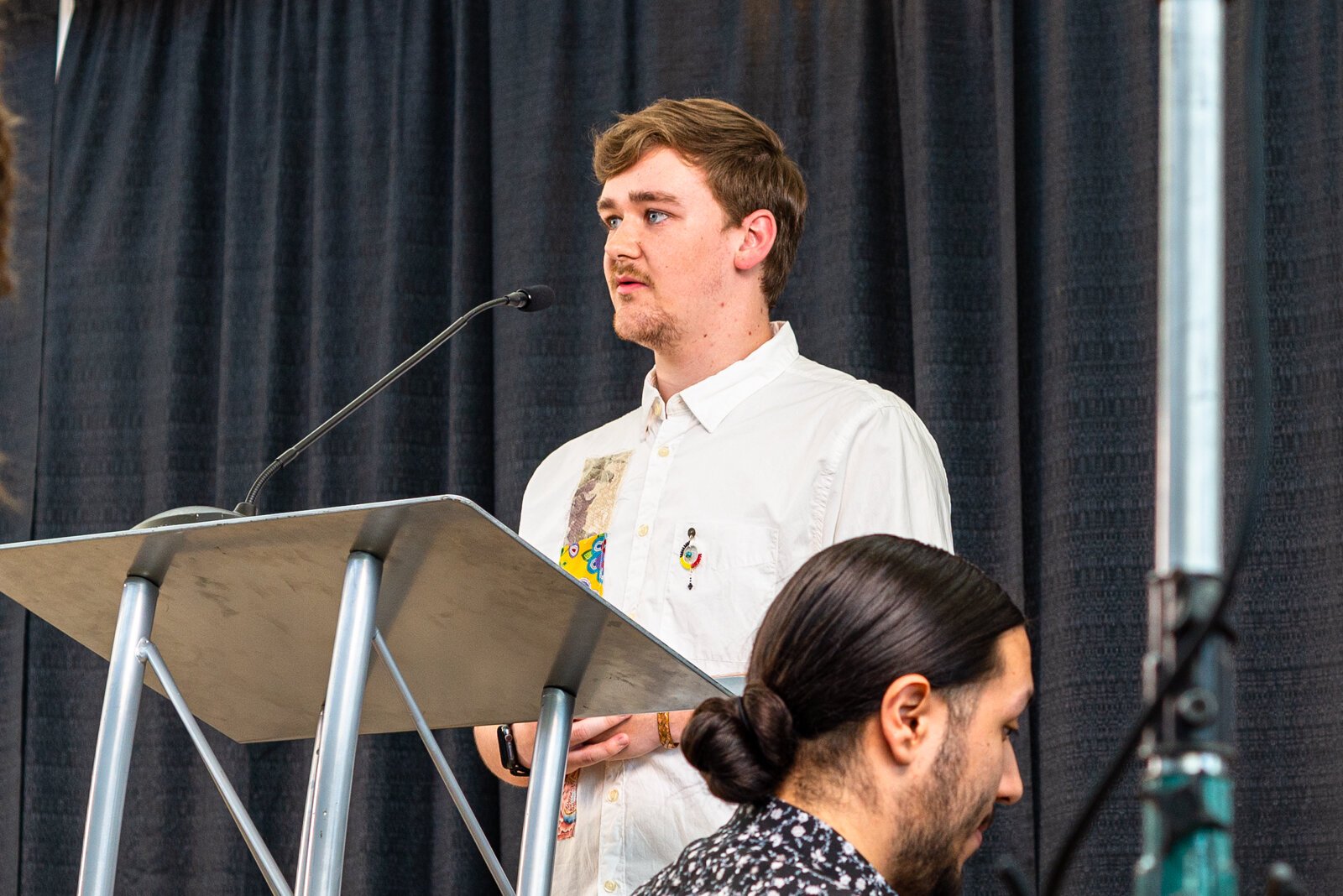  Skyler Wolverton, president of the Native American Student Organization at WMU, speaks at “We Talk.”