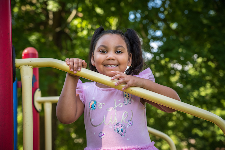 Kymberlee Castaneda on the the play equipment at Reed Park. Photo by Fran Dwight.