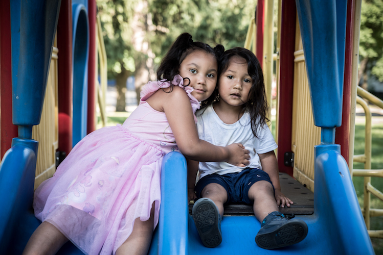 Kymberlee and Jerome Castaneda at the top of the slide. Photo by Fran Dwight.