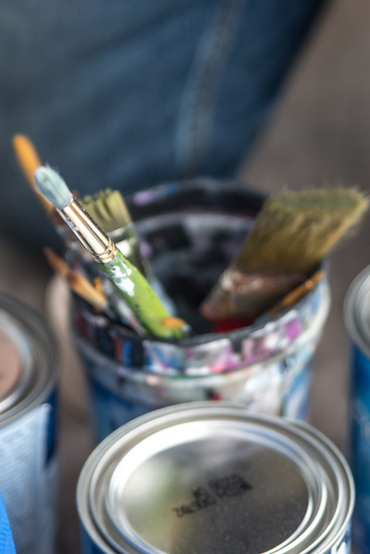 Tools Patrick Hershberger uses while at work on a new mural for the Edison neighborhood. Photo by Fran Dwight