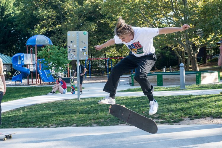 Experienced and inexperienced skateboarders like the vibe of the Davis Street Skate Plaza.