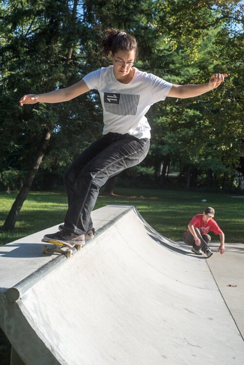 Skateboarders at the Davis Street Skate Plaza provide daylong entertainment for those who pass by.