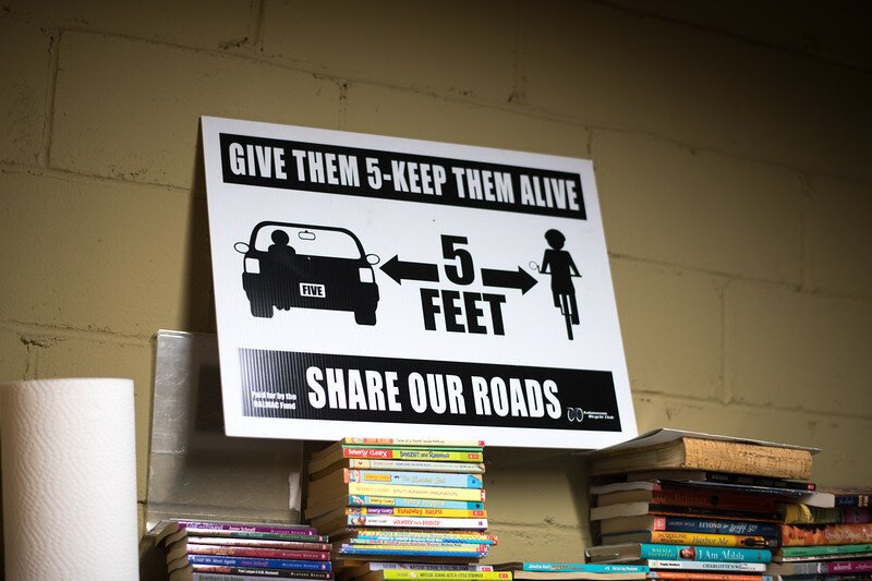 A sign seen around Kalamazoo to remind motorists to give bicyclists space on the road.