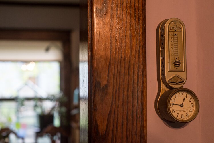 Many original or later details grace older homes, such as this antique thermostat.