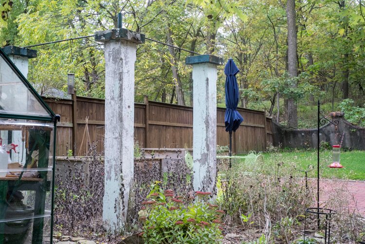 Original pillars from a former concrete wall adjacent to Western Michigan University's former East Campus still grace McVey's and Lindemann’s Merrill Street home.