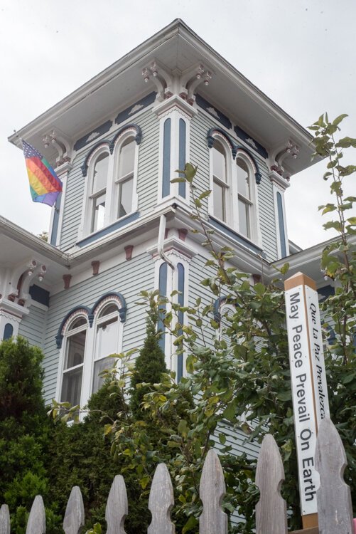  Ira Bixby house, owned by Nathan and Heather Dannison, is a warm, cheerful beacon in Kalamazoo's Vine neighborhood.