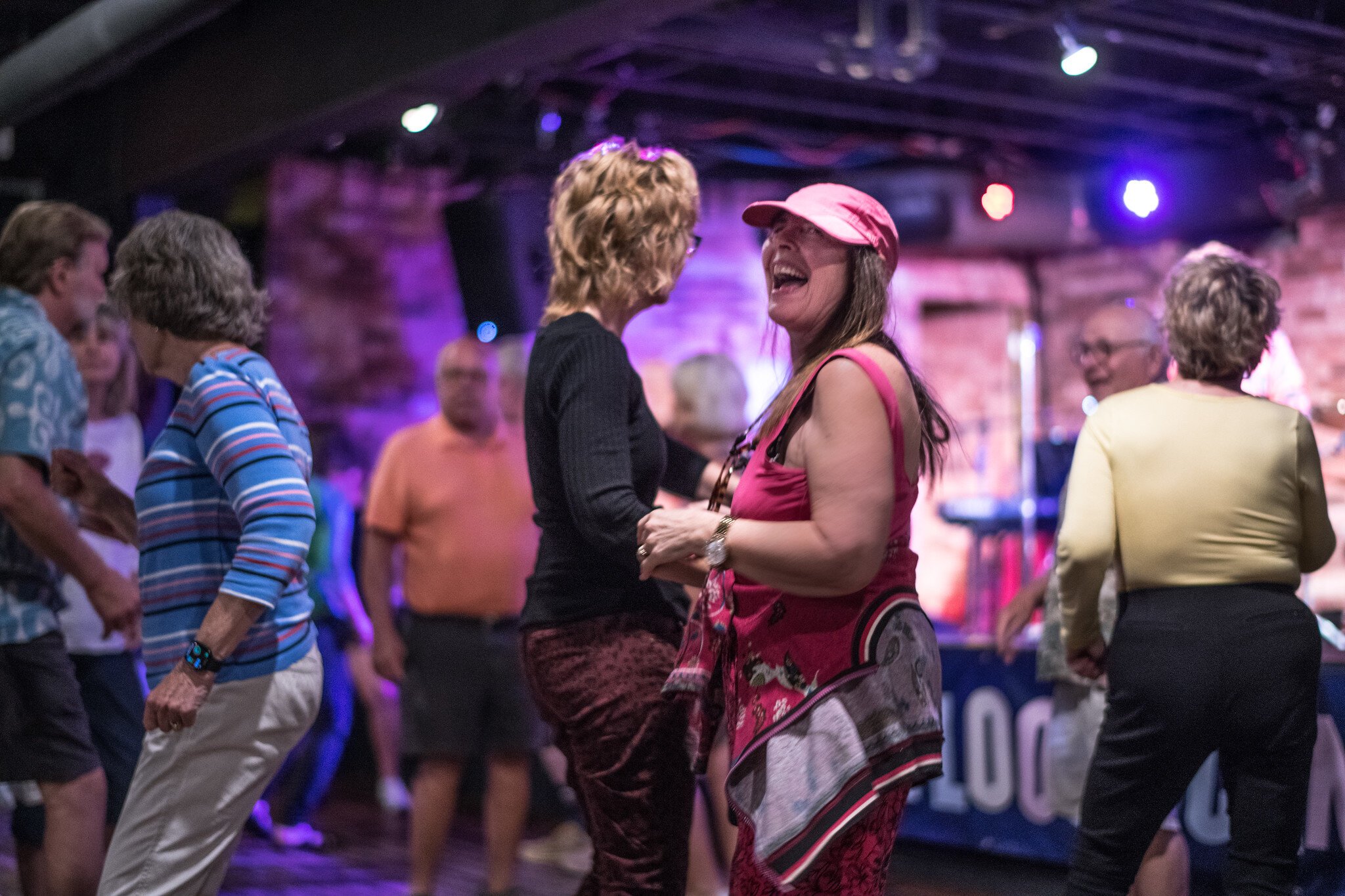 Dancers celebrate 'geezerhood' at the Geezer Happy Hour.