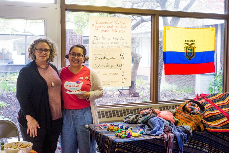 First grade teacher Mary Mazei and her daughter, Nina, are selling exports from Ecuador, birthplace of Mazei's husband Felix.