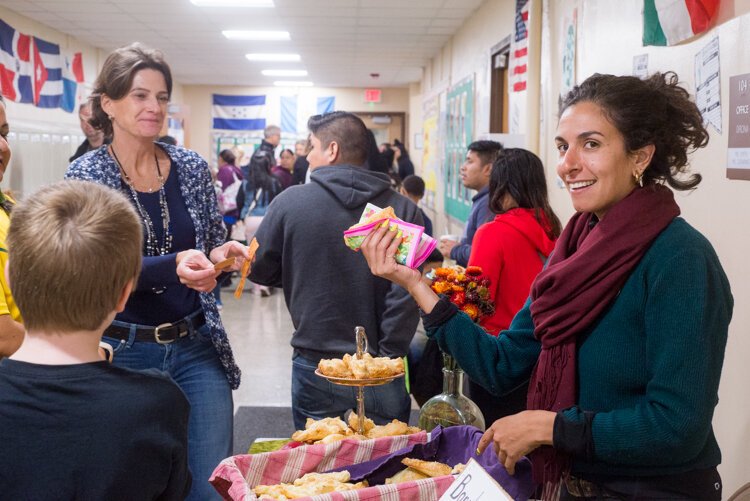 El Sol teacher Leslie Serri sells bourekas, an Israeli cheese-filled pastry.